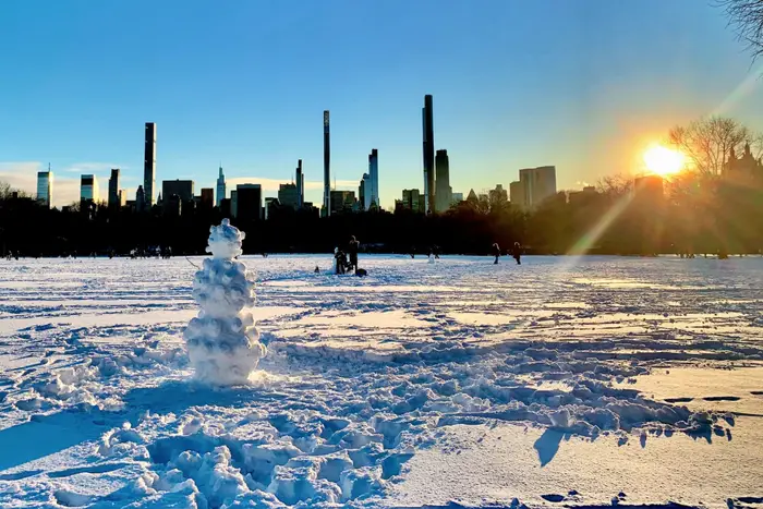 A photo of a snowman on the great lawn in Central Park, December 2020